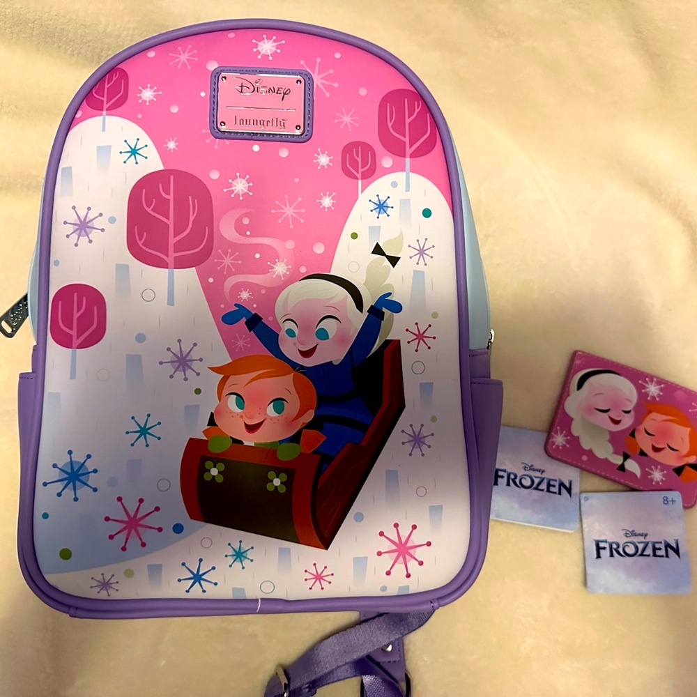 Loungefly Anna and Elsa backpack and card holder.